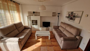 Chalet Adosado con jardín